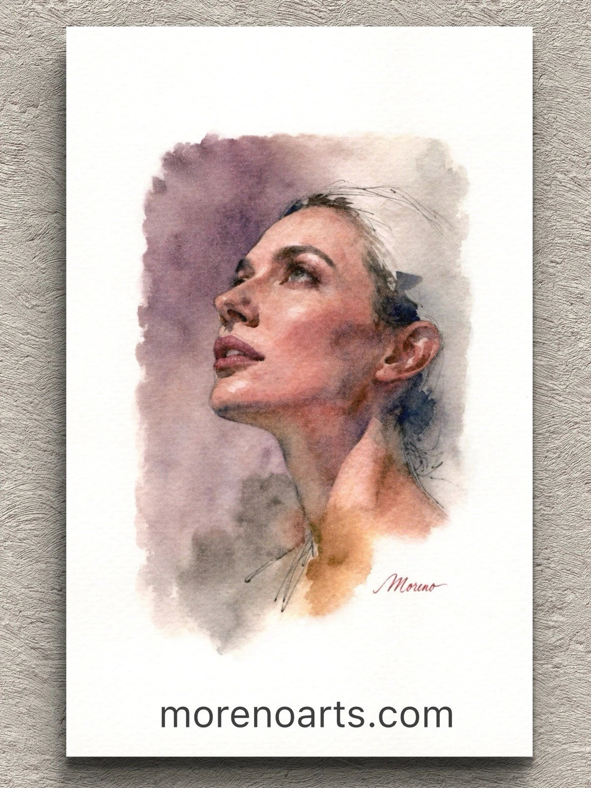 White book page featuring a watercolor-style portrait of a woman in a soft purple tone, with “Morenoarts.com” text at bottom.