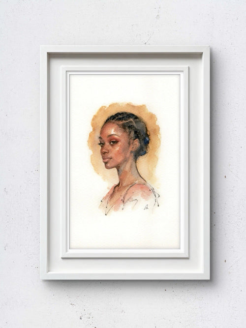 White-framed portrait of a woman in a pale pink tutu with dark brown hair, set against a neutral background.