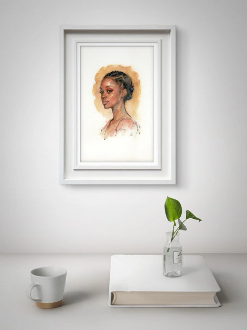 White-framed portrait of a woman in brown tones against a plain light background with green leaves beside a white cup.