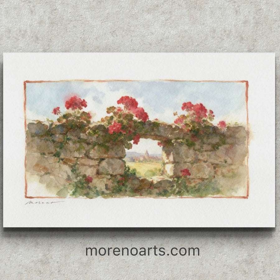 Original watercolor painting of red geraniums growing on a stone wall with a scenic view of rolling hills and sky.