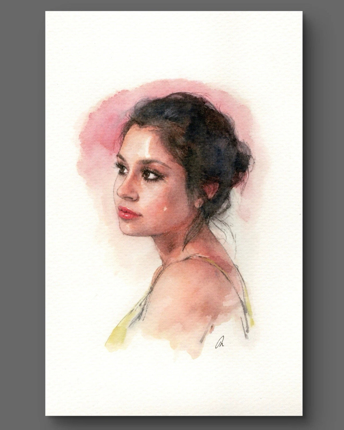 Original watercolor female figure portrait, 5.5x8.5 book page, featuring soft pink-gold foliage background and artist’s signature.